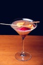 Gourmet mixology on black background with space for text. Fruit mixology. Vertical shot Royalty Free Stock Photo