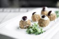 Gourmet organic scotch quail eggs starter snack on table Royalty Free Stock Photo