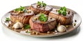 Gourmet pan-seared filet mignons with herb garnish and garlic on a sleek plate. Generative AI Royalty Free Stock Photo