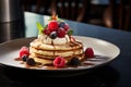 A gourmet pancakes crepes with berries, tasty breakfast Royalty Free Stock Photo