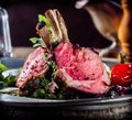 Gourmet rare roasted lamb cutlets with spices Royalty Free Stock Photo