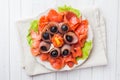 Gourmet restaurant serving a plate of smoked salt, raw white fish fillets and salmon. Delicacy fresh seafood dish with catfish, Royalty Free Stock Photo