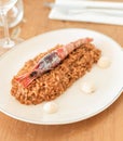 Gourmet rice dish with coastal shrimp