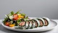 Gourmet Spinach and Salmon Roll with Mixed Garden Salad. Royalty Free Stock Photo