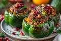 Gourmet Stuffed Bell Peppers with Ground Meat, Rice, Vegetables, and Pomegranate Seeds on Rustic Table Royalty Free Stock Photo