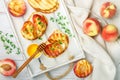 Gourmet summer Breakfast - sandwiches bread toast, bruschetta with grilled peaches Royalty Free Stock Photo