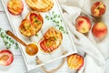 Gourmet summer Breakfast - sandwiches bread toast, bruschetta with grilled peaches Royalty Free Stock Photo