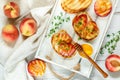 Gourmet summer Breakfast - sandwiches bread toast, bruschetta with grilled peaches Royalty Free Stock Photo