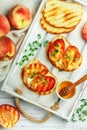 Gourmet summer Breakfast - sandwiches bread toast, bruschetta with grilled peaches Royalty Free Stock Photo