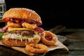 Gourmet Surf and Turf burger with squid rings Royalty Free Stock Photo