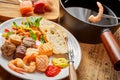 Gourmet surf and turf fondue with meat and fish Royalty Free Stock Photo