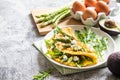 Gourmet Tasty Egg Omelette with Asparagus and soft Cheese. Asparagus. Fresh Asparagus with eggs Royalty Free Stock Photo
