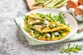 Gourmet Tasty Egg Omelette with Asparagus and soft Cheese. Asparagus. Fresh Asparagus with eggs Royalty Free Stock Photo