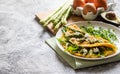 Gourmet Tasty Egg Omelette with Asparagus and soft Cheese. Asparagus. Fresh Asparagus with eggs Royalty Free Stock Photo