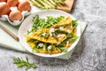 Gourmet Tasty Egg Omelette with Asparagus and soft Cheese. Asparagus. Fresh Asparagus with eggs Royalty Free Stock Photo