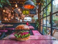 Gourmet Veggie Burger on Rustic Wooden Table with Cozy CafÃÂ© Ambiance in the Background