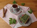 Goutweed ginger green cake on plate, organic food