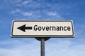 Governance road sign, arrow on blue sky background Royalty Free Stock Photo