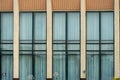 A government building with large glass windows and doors. Modern office building. Architecture and facade of the building