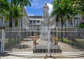 The Government House of Mauritius, with statue of Queen Victoria behind the main gate Royalty Free Stock Photo