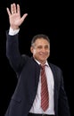 Government, politician and man on black background with hand for wave, greeting and support. Success, political campaign