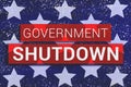 Government Shutdown Text With stars of Us Flag on blue background