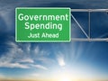 Government spending just ahead . Street exit sign showing the increase of government spending in the future.