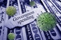 Government Spending news headline with Coronavirus on money Royalty Free Stock Photo