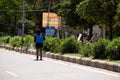 Government Worker Spraying Sanitizer Spray on Road to Prevent from The Corona-Virus Or Covid-19 Virus