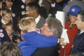 Governor Bill Clinton embraces a child at a Denver campaign rally in 1992 on his final day of campaigning in Denver, Colorado Royalty Free Stock Photo