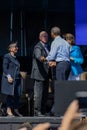 Governor Jerrry Brown speaking with President Obama on stage Lake Tahoe Summit