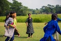 Children playing kanamachi, a popular traditional game in Bangladesh and in the Indian states during the leisure time.