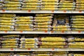 Bags of Goya dried beans stacked on market shelves