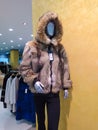 womans many color winter fur clothes in fashion shop , Fashion clothes, interior