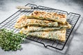 Gozleme Turkish stuffed pastrie, flatbread with greens and cheese. White background. Top view Royalty Free Stock Photo