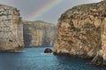 Gozo island cliffs, Malta seaside landscape with rainbow Royalty Free Stock Photo