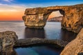 Gozo, Malta - The beautiful Azure Window, a natural arch and famous landmark on the island of Gozo at sunset Royalty Free Stock Photo