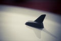 GPS antenna shark fin shape on a roof of car Royalty Free Stock Photo