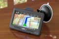 GPS navigation device on the wooden table. 3D rendering