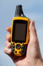 GPS Navigator in the hand Royalty Free Stock Photo