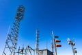 GPS Radio communication towers and sky Royalty Free Stock Photo