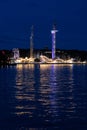 Reflections at night of the amusement park GrÃ¶na Lund in Stockholm, Sweden Royalty Free Stock Photo