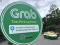 Grab taxi pick up point sign in Bangkok