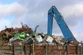 Grab working in a scrap metal yard