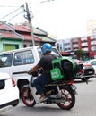 GrabFood Delivery Rider On His Motorbike