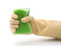 Grabing a cleaning sponge Royalty Free Stock Photo