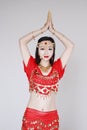 Graceful Asian Chinese belly dancer in White background Royalty Free Stock Photo