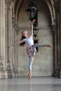 Graceful ballerina dancing in a palace Royalty Free Stock Photo