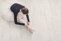 Graceful Ballerina stretching, ballet background, top view Royalty Free Stock Photo