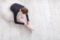 Graceful Ballerina stretching, ballet background, top view Royalty Free Stock Photo